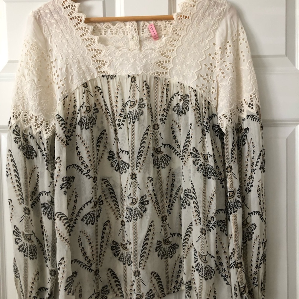 Women’s cream & black floral blouse